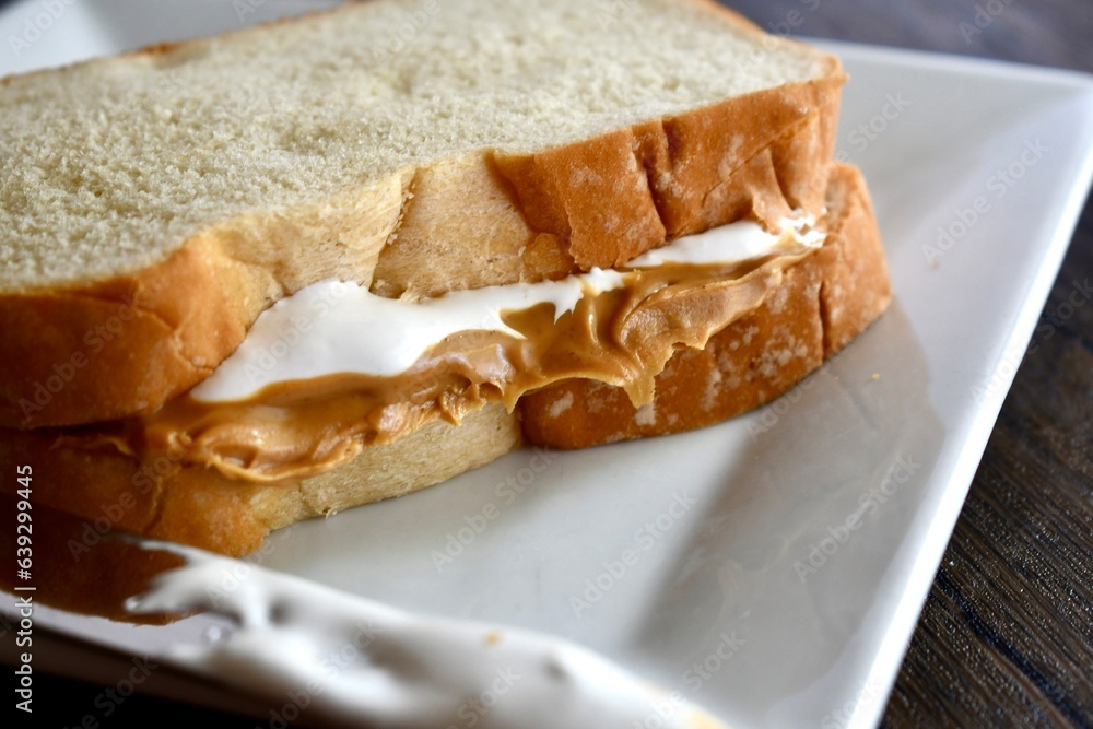 Fluffernutter sandwich on a white plate Fluffernutter sandwich on a white plate