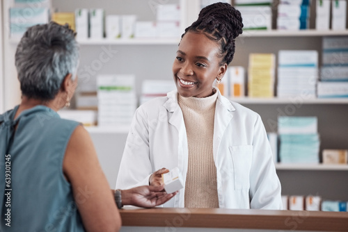 Pharmacist, pharmacy woman and customer for medicine service, healthcare advice and clinic solution or support by counter. African doctor or medical people with box for pills, product or retail drugs photo