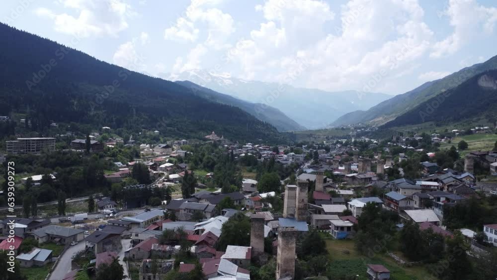 This is an aerial drone camera shot of village in Svaneti region, Georgia, Caucasus mountains. Shot taken on a sunny summer day Mestia, ushguli , georgia This is an aerial drone camera shot of village in Svaneti region, Georgia, Caucasus mountains. Shot taken on a sunny summer day Mestia, ushguli , georgia