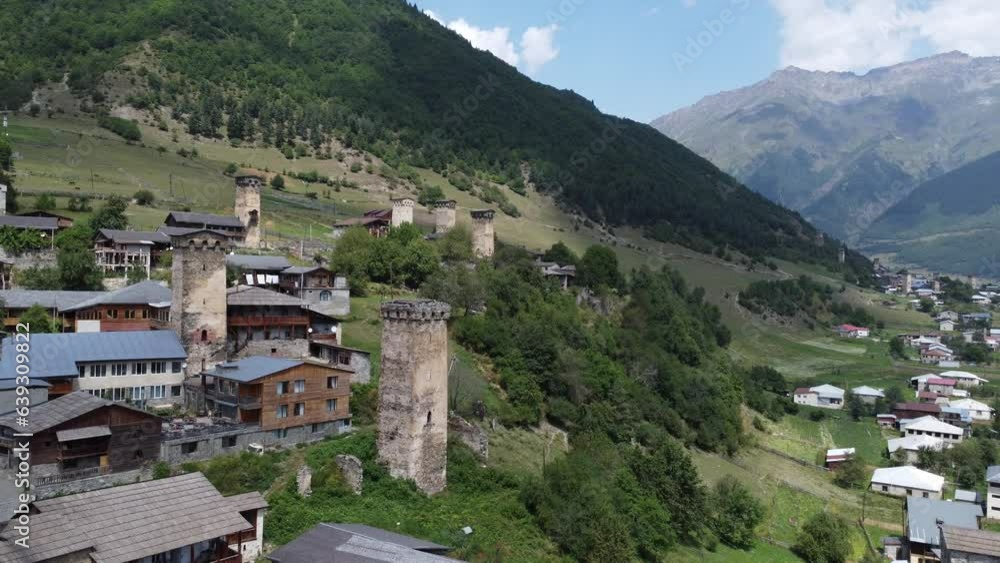 This is an aerial drone camera shot of village in Svaneti region, Georgia, Caucasus mountains. Shot taken on a sunny summer day Mestia, ushguli , georgia This is an aerial drone camera shot of village in Svaneti region, Georgia, Caucasus mountains. Shot taken on a sunny summer day Mestia, ushguli , georgia