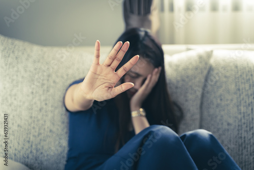 sexual abuse for women gender in society, a girl hand is stopping harassment on the bedroom of family. stop violence against Women, international women's day