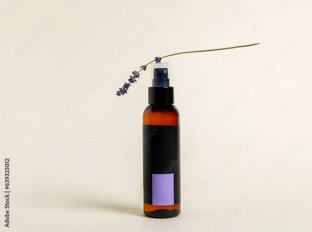 spray with lavender threads surrounded on surface,flat lay front view product photography. spray for pillow to sleep well spray with lavender threads surrounded on surface,flat lay front view product photography. spray for pillow to sleep well