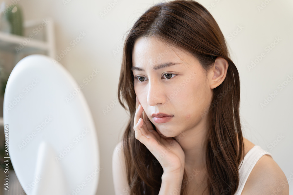 Young woman asian are worried about faces Dermatology and allergic to steroids in cosmetics. sensitive skin, red face from sunburn, acne, allergic to chemicals, rash on face. skin problems and beauty Young woman asian are worried about faces Dermatology and allergic to steroids in cosmetics. sensitive skin, red face from sunburn, acne, allergic to chemicals, rash on face. skin problems and beauty