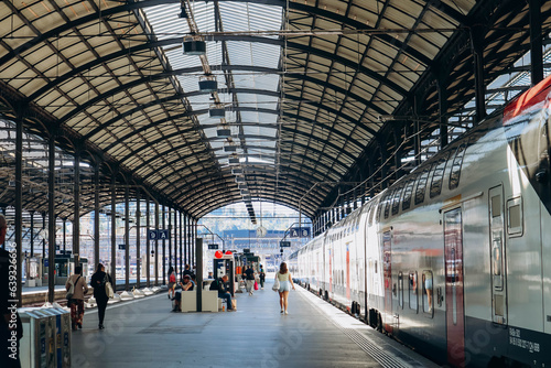 Lucerne, Switzerland - August 10, 2023: Platform at Lucerne Central Railway Station, Switzerland photo