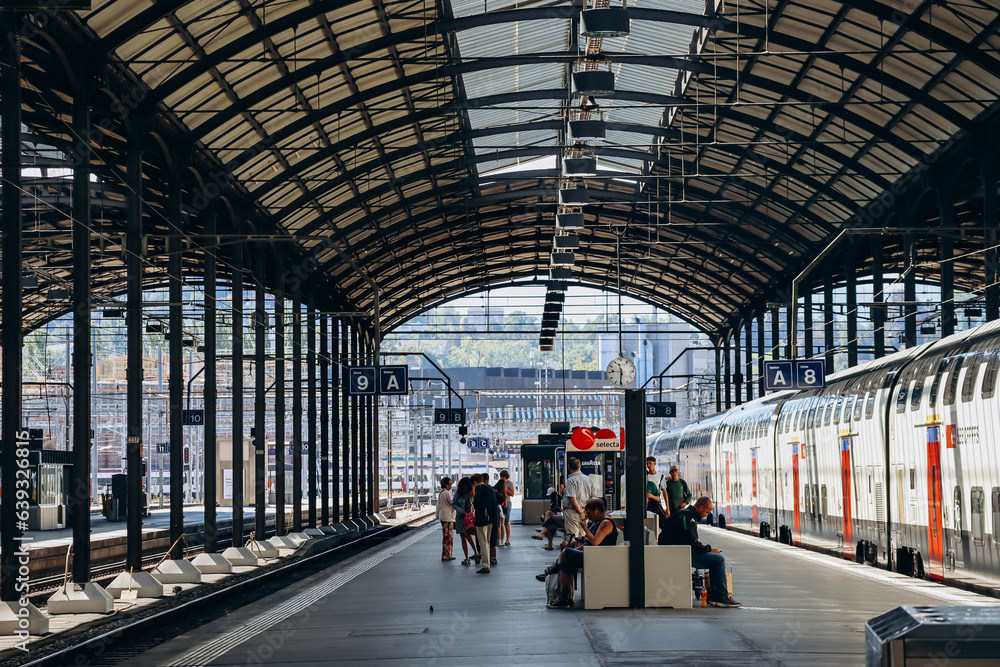 Lucerne, Switzerland - August 10, 2023: Platform at Lucerne Central Railway Station, Switzerland Lucerne, Switzerland - August 10, 2023: Platform at Lucerne Central Railway Station, Switzerland