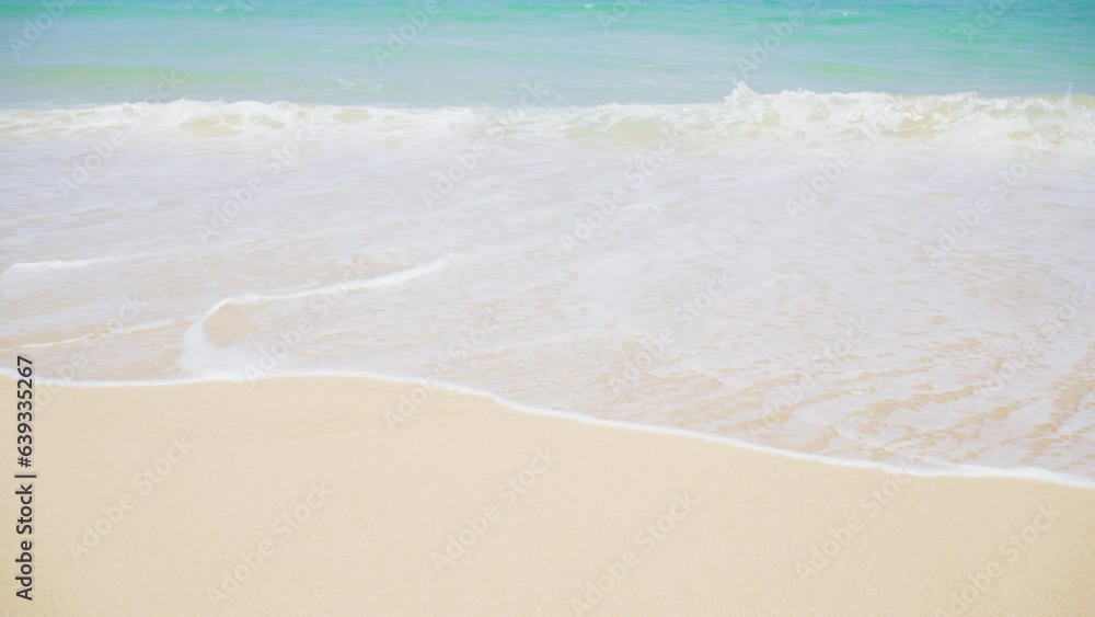 Beautiful white sand clean beach. Waves texture Lapping across untouched Shore. Beautiful white sand clean beach. Waves texture Lapping across untouched Shore.