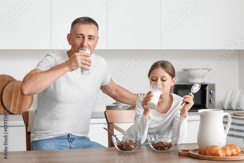 Little girl with her father...