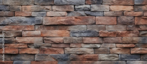 Granite stone walls with a seamless brick pattern texture as a background