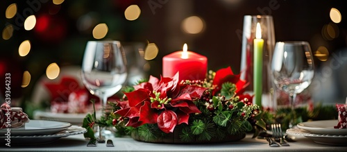 Closeup of mistletoe wreath on Christmas dining table