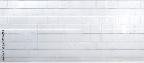 Pattern on a wall consisting of white tiles