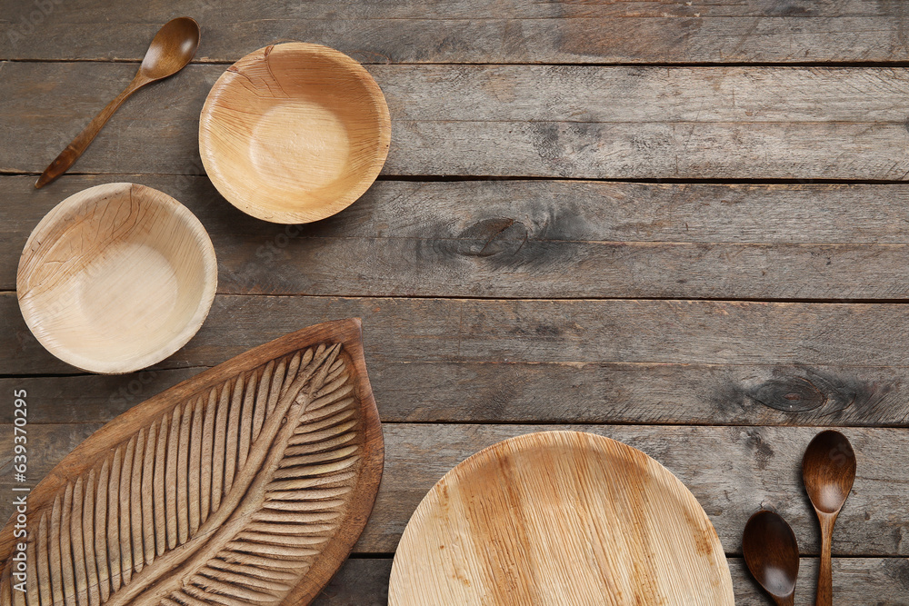 Different tableware on wooden background Different tableware on wooden background
