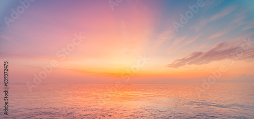 Inspirational calm sea with sunset clouds sky. Meditation ocean and sky background. Colorful horizon over the water. Relaxing seascape skyscape sun rays. Panoramic nature horizon dream fantasy ecology