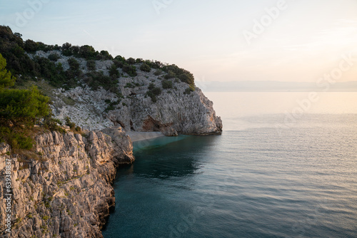 Fototapeta Naklejka Na Ścianę i Meble -  Panoramic picture of Brseč beach in the morning with beautiful sunlight