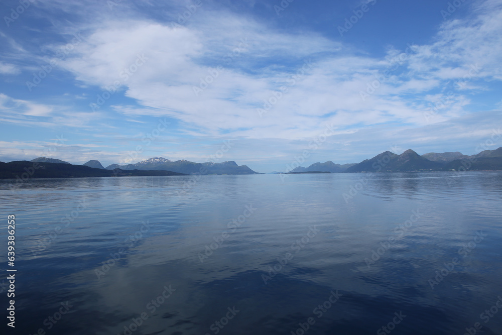 Sea with mountains in the background. View of sea in Molde, Norway.