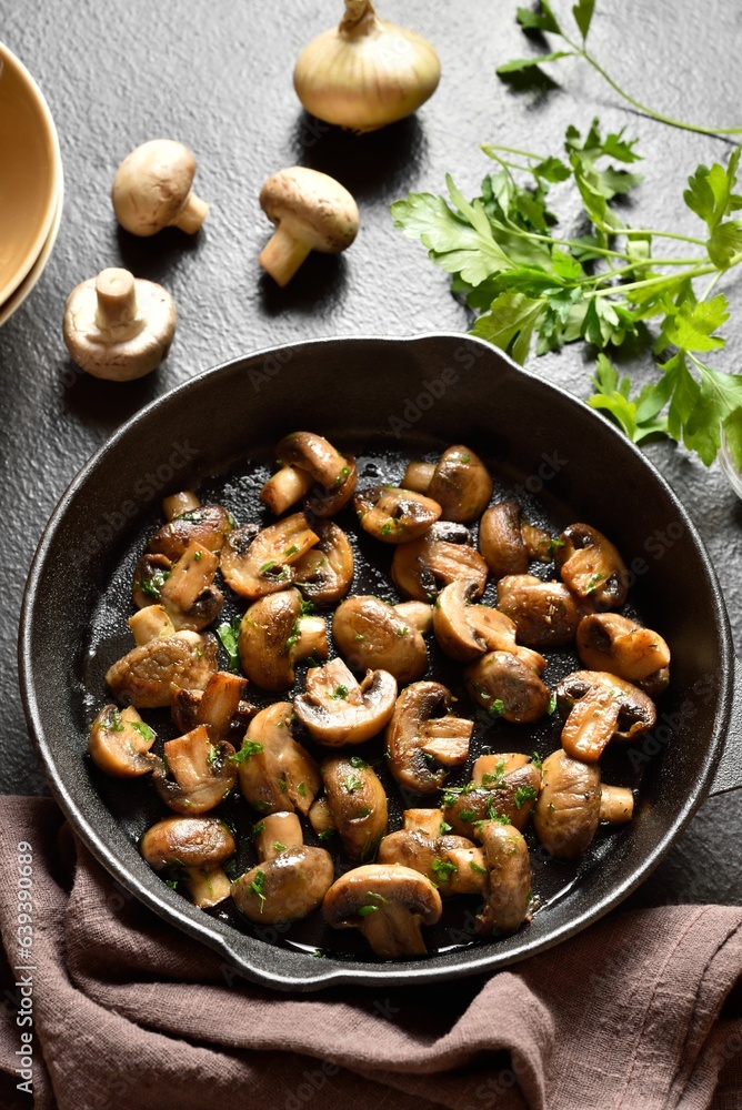 Roasted mushroom in cast iron pan Roasted mushroom in cast iron pan