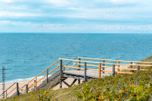 Sylt Island landscape with wooden stairs and the North Sea at © YesPhotographers