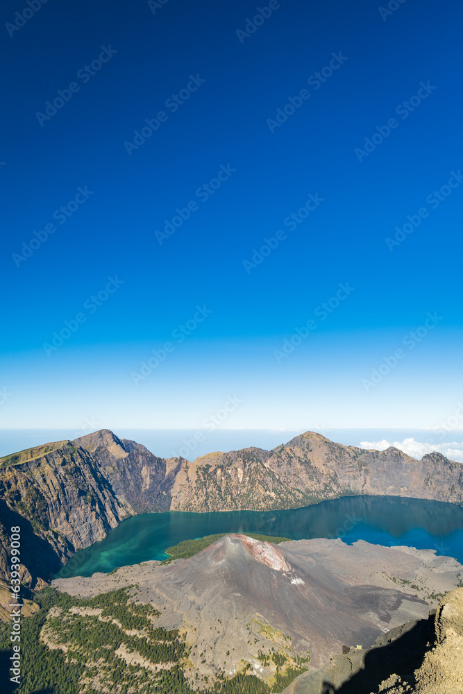 Mount Rinjani crater and lake view at sunrise, Lombok, Indonesia. Rinjani is the second highest active volcano in Indonesia