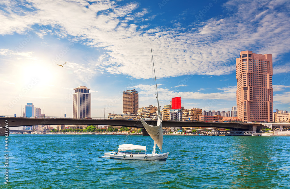 Bridge over the Nile, river board and fancy buildings of Cairo, beautiful day view, Egypt