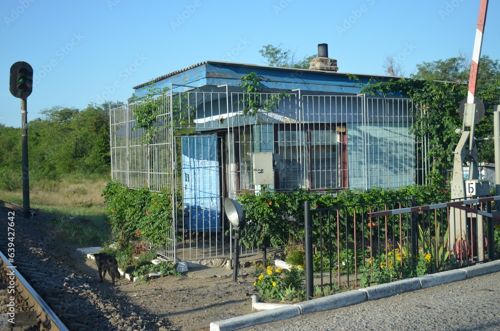 Fototapeta premium An overgrown post for railroad station workers.