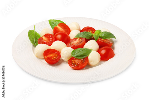 Plate of delicious Caprese salad with tomatoes, mozzarella and basil isolated on white