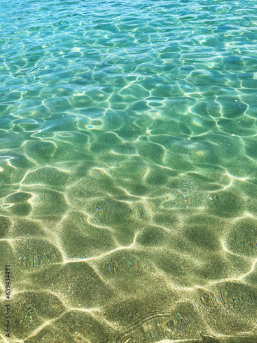 Beautiful beach with transparent clear water, Ripples are cool in summer of Japan.