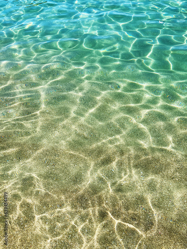 Beautiful beach with transparent water. Ripples are clear and cool in summer of Japan.