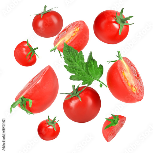 Many fresh ripe tomatoes falling on white background