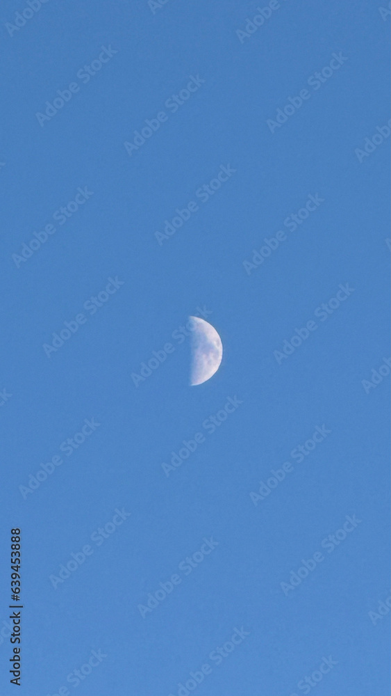 half moon in the sky daytime blue sky lunar emotional sentimental clear sky background wallpaper minimalist half moon in the sky daytime blue sky lunar emotional sentimental clear sky background wallpaper minimalist