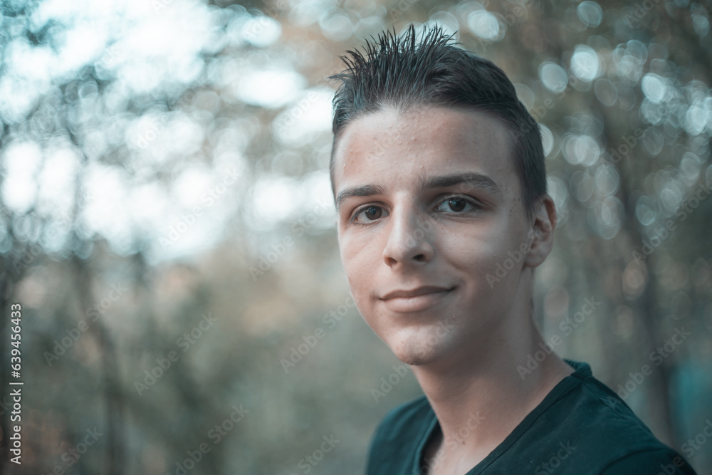 portrait of a handsome boy outside in natural light portrait of a handsome boy outside in natural light