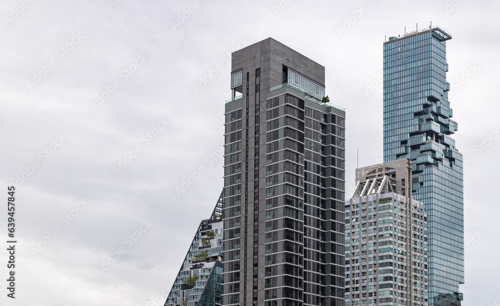 Bangkok, Thailand - 16 Jul 2023 - Architectural view of Skyscraper with Beautiful modern exterior buildings in Central Business district of Bangkok city. Copy space, Selective focus. Bangkok, Thailand - 16 Jul 2023 - Architectural view of Skyscraper with Beautiful modern exterior buildings in Central Business district of Bangkok city. Copy space, Selective focus.
