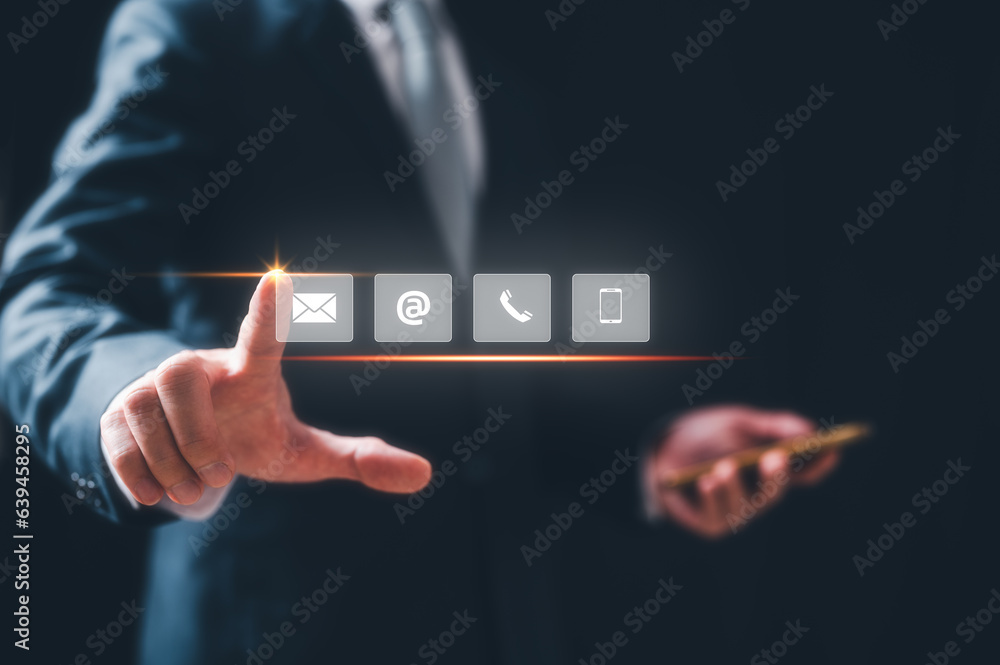 concept of Contact us or Customer support hotline people connect, businessman touching on virtual screen contact icons, email, address, live chat, phone. Customer service, help desk online support concept of Contact us or Customer support hotline people connect, businessman touching on virtual screen contact icons, email, address, live chat, phone. Customer service, help desk online support