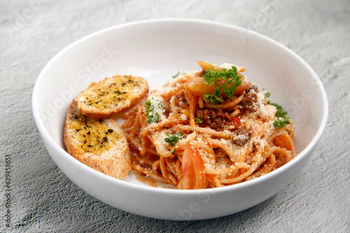 Freshly cooked Pasta with assorted toppings served with garlic bread