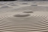 Rounds made of sand. A distant Japanese Zen garden. Generative AI