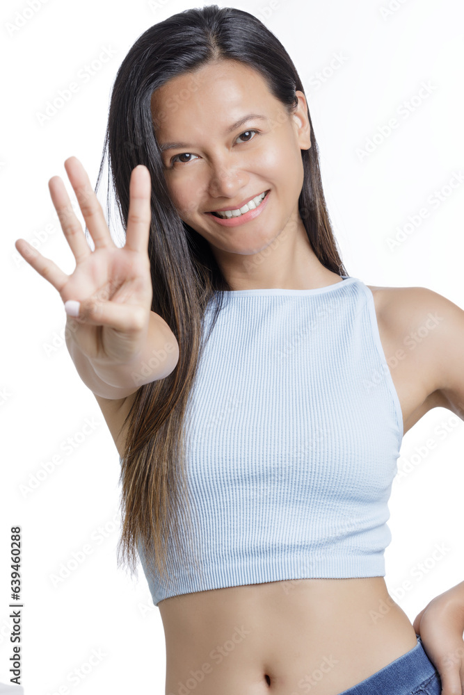 Asian Woman using her fingers to count four white bachground Asian Woman using her fingers to count four white bachground