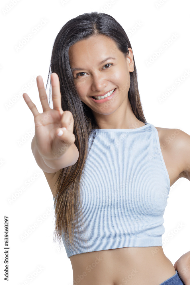 Asian Woman using her fingers to count three white bachground Asian Woman using her fingers to count three white bachground
