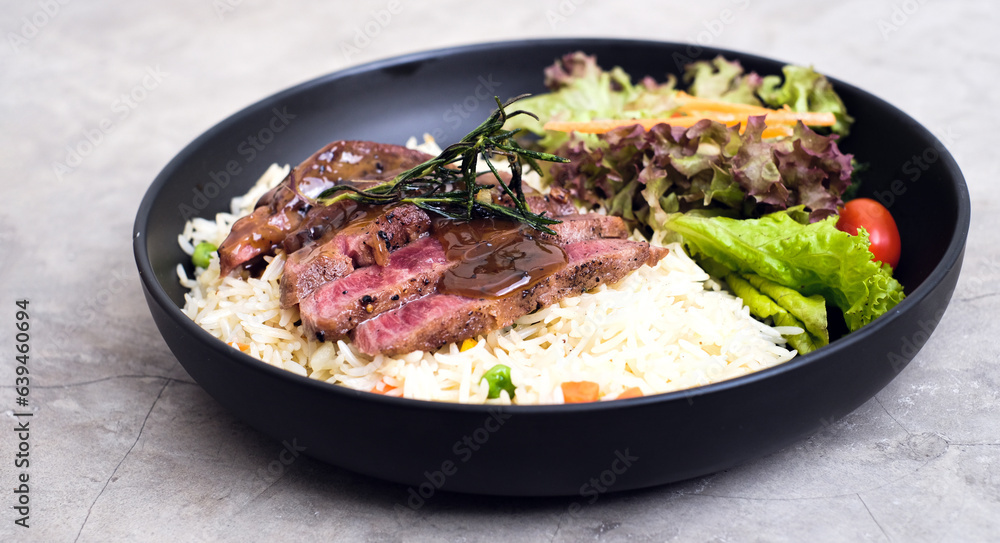 New York-Style Sliced Beef with Butter Rice and Vibrant Vegetables New York-Style Sliced Beef with Butter Rice and Vibrant Vegetables