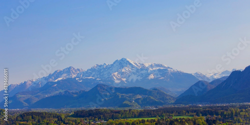 The mountain view of alpine as snow-capped mount peaks in Winter mountains, panorama scene