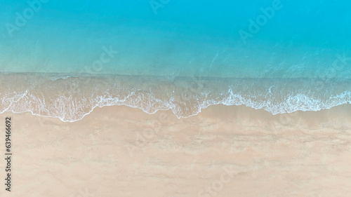 Beach Wave water in the Tropical summer beach with  sandy beach background photo