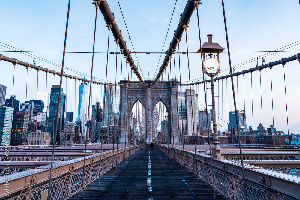 Fototapeta premium architecture of historic bridge in brooklyn. new york bridge connecting Manhattan and Brooklyn. Historic landmark. brooklyn bridge of new york city. american architecture landmark