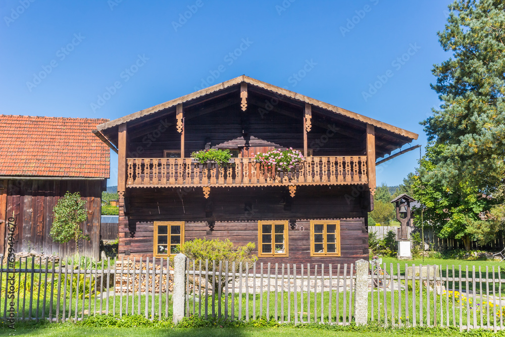 Traditional wooden house with balcony in Volary in the Sumava mountains, Czech Republic