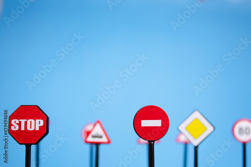 road regulations, car accident prevention, traffic safety materials for educational, road signs on blue background