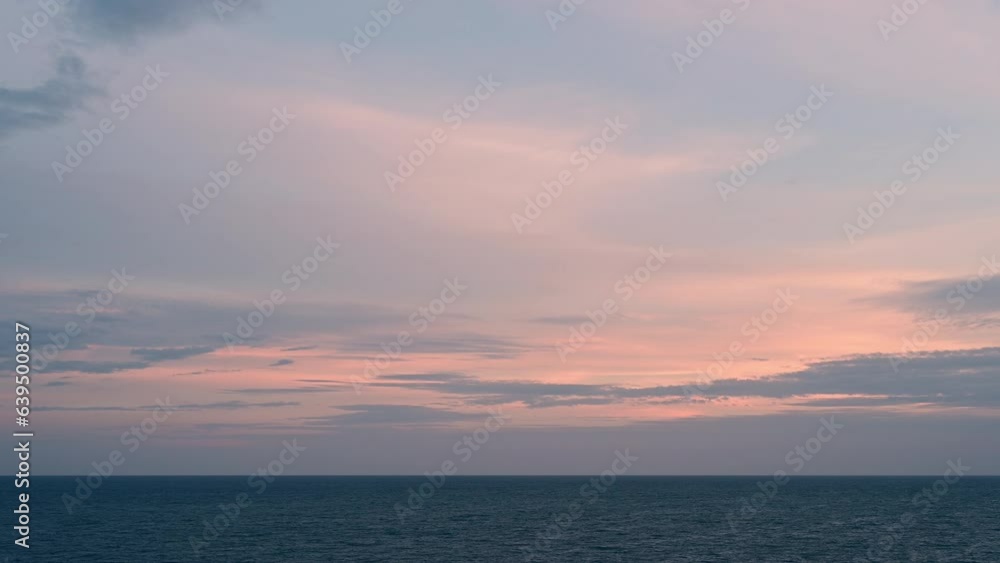 Timelapse of the colorful sunset view at the island beach with ocean waves and clouds in the background with 4K resolution. Timelapse of the colorful sunset view at the island beach with ocean waves and clouds in the background with 4K resolution.