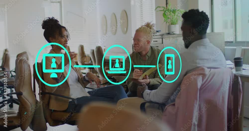 Animation of flowchart of icons over diverse coworkers sharing ideas in office