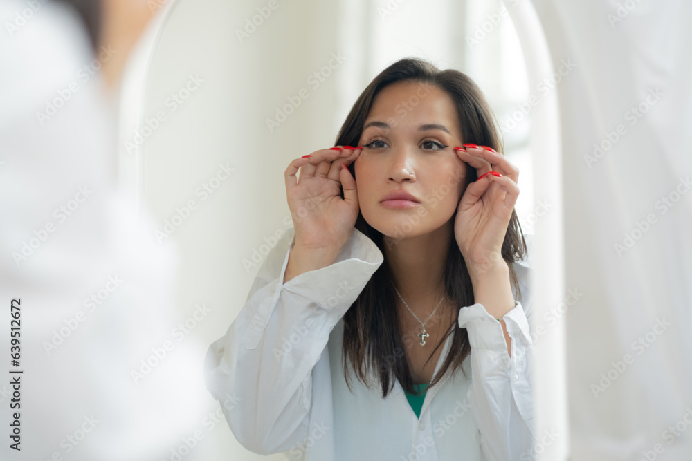 woman clean fresh healthy white skin looking at mirror.spa and beauty concept woman clean fresh healthy white skin looking at mirror.spa and beauty concept
