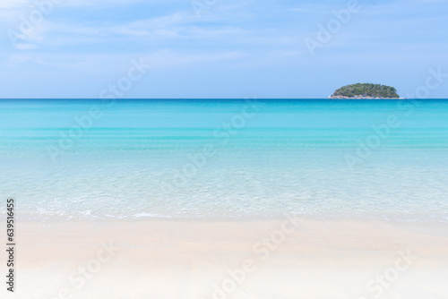 Fototapeta Naklejka Na Ścianę i Meble -  Beautiful Kata Beach with crystal clear water and blue sky, famous tourist destination and resort area in Phuket, Southern of Thailand