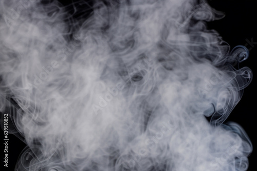 Beautiful white smoke with natural pattern on black background with charming pattern