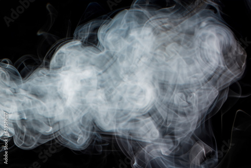 Beautiful white smoke with natural pattern on black background with charming pattern