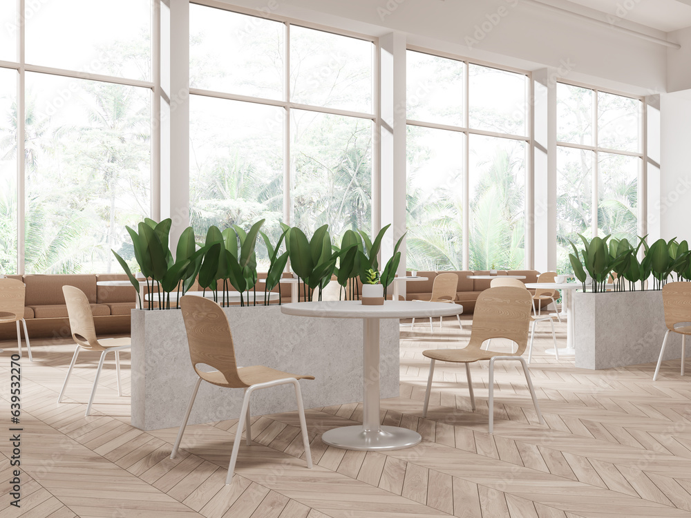White restaurant corner with sofas and windows White restaurant corner with sofas and windows