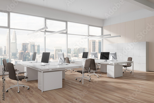 Canvas Print White office loft interior with pc monitors and table near panoramic window