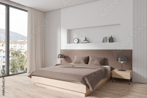 White hotel bedroom interior with bed and stylish decoration  window